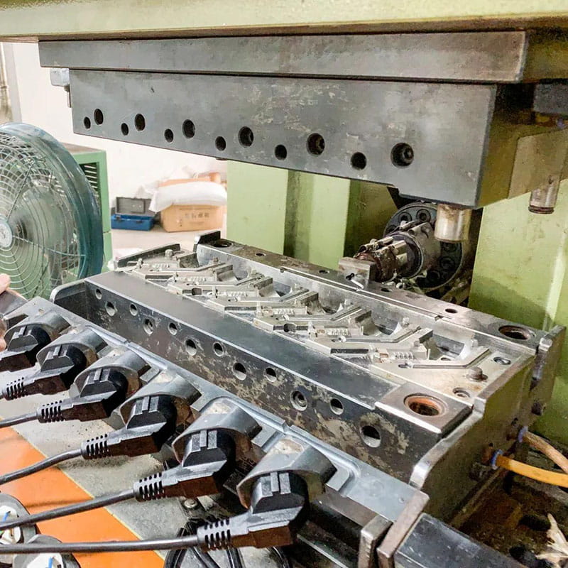 Power cord plug molding equipment at Junde factory